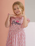 "Believe" dress
